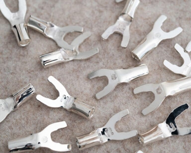 Handmade spade connectors crafted from solid silver and hallmarked in the UK by the Birmingham Assay Office (Founded in 1773).